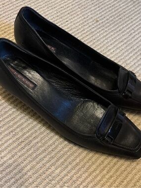 Prada Black Leather Square-Toe Loafers with Buckle Detail